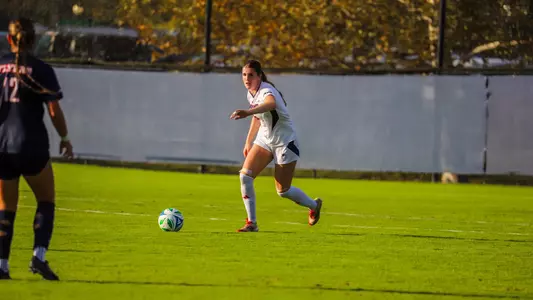 Erika Schneider with the ball vs Dayton
