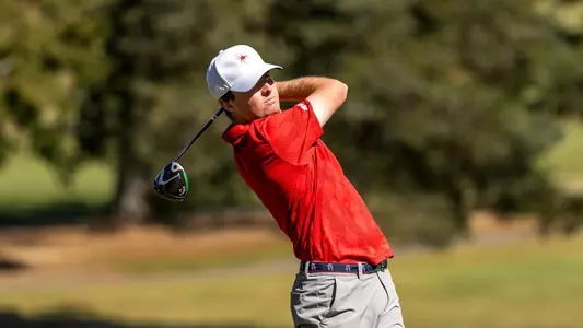 Quin Polin holds his follow through after a drive