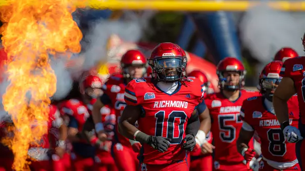 Isaiah Dawson runs onto the field during Richmond's game against Holy Cross on Oct. 18