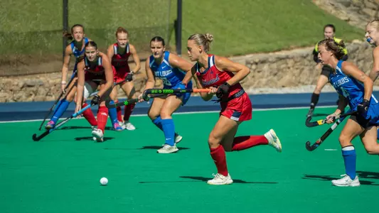 Spider field hockey's Clara Larripa moves to shoot at the goal against Saint Louis