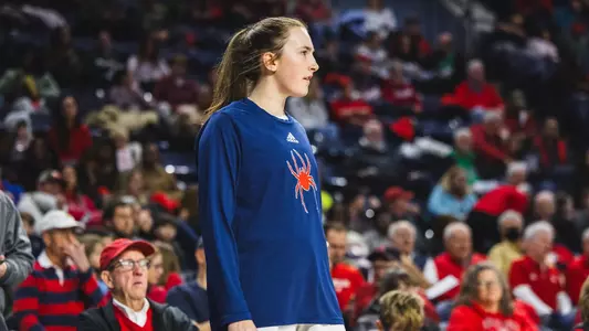 Maggie Doogan in warmup suit