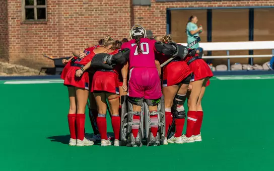 Spider Field Hockey pregame huddle