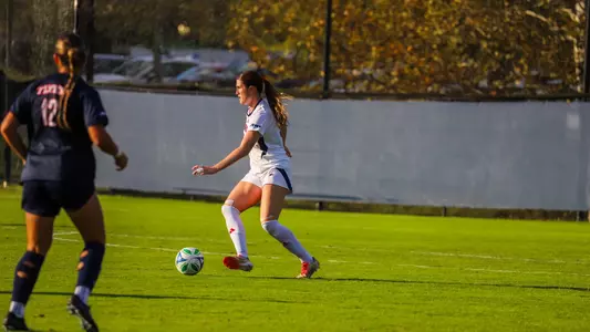 Erika Schneider dribbling the ball