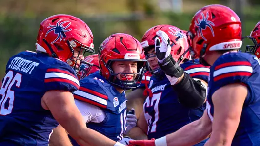 Kyle Wickersham celebrates a touchdown against Fordham on Nov. 1, 2025