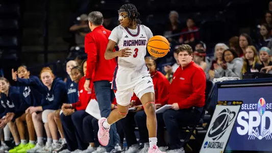 Alicia Newell Dribbling on home court