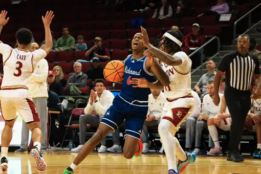 AJ Lopez is fouled while driving to the basket