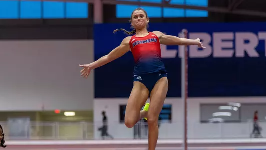 Molly Wise competing in the long jump at Liberty