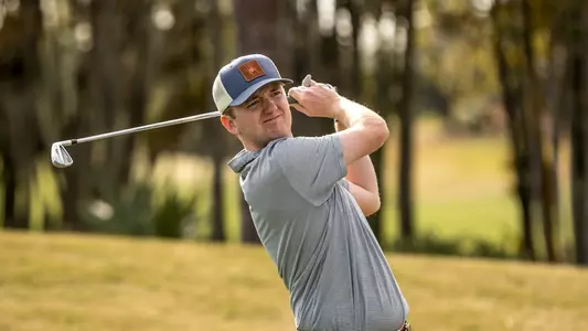 Patrick Isztwan stares down his approach shot into the green