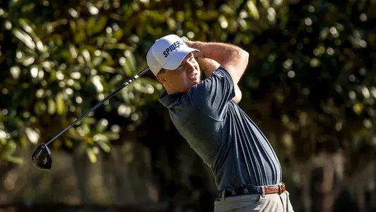 Quin Polin holds his follow through on the tee box