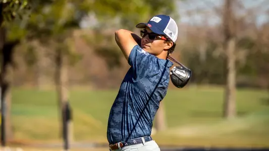 Carson Baez follows through after a shot