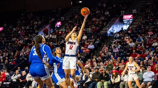 Faith Alston going for a layup