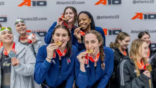 200 free relay with gold medal finish and breaks school record