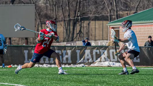 Lukas Olsson shoots on a Lehigh defender during Richmond's 9-8 win over Lehigh on Feb. 22, 2025