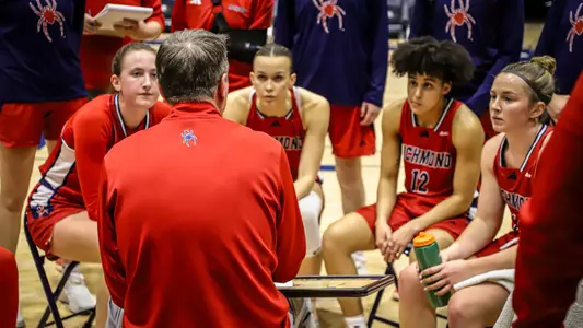 Aaron Roussell talking to his team during a time out