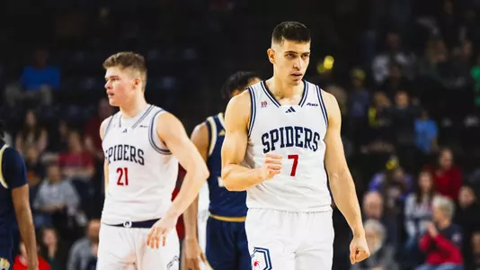 Dusan Neskovic pumps his fist after a basket