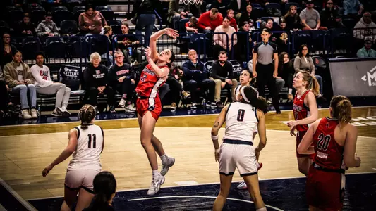 Ullstrom posting a layup vs Duquesne