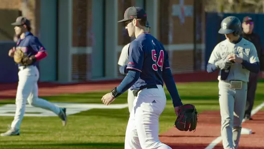 Sam Young walks off the field after retiring the side against Penn State