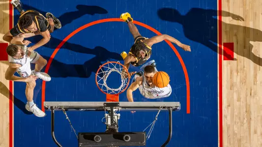 An overheard image as Dusan Neskovic attempts a layup vs VCU