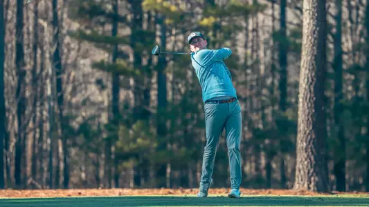 Patrick Isztwan holds his follow through on the tee