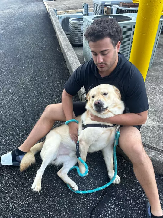 Brian Catanzarite with a white dog