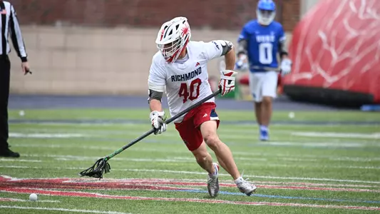 Tommy Stull goes to scoop a ground balls against Duke on March 15, 2025