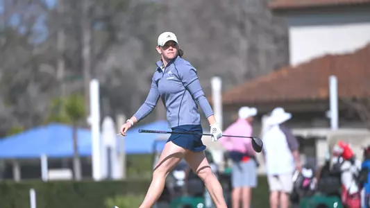 Hannah Lydic strides off the tee box following her shot