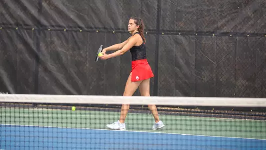 Bakhaya about to serve the ball