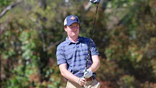 Quin Polin squints to find his line on the tee box