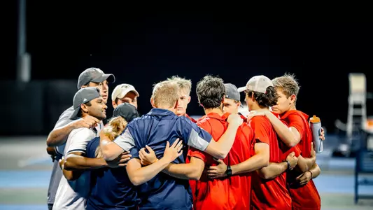 Men's Tennis Huddled before the game against George Mason