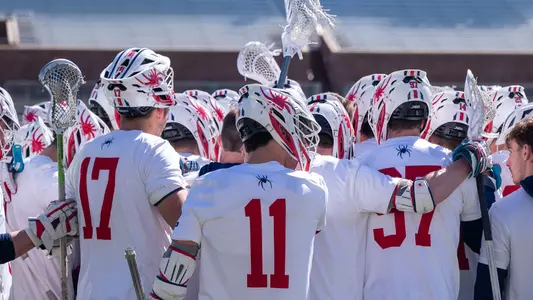 Richmond men's lacrosse team huddle
