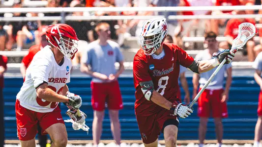 Charlie Packard works past a Cornell defender during Richmond's 13-12 quarterfinals loss on May 17, 2025 in Hempstead, N.Y.