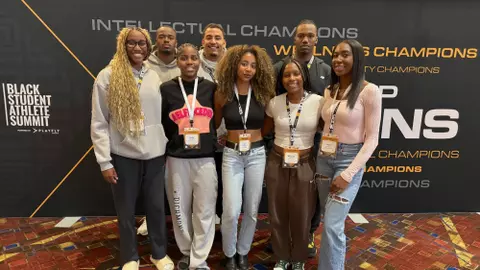 A group of Spider student-athletes pose together at the Black Student-Athlete Summit