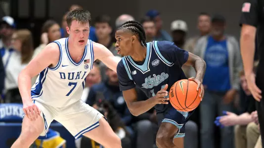 AJ Lopez dribbles against Duke