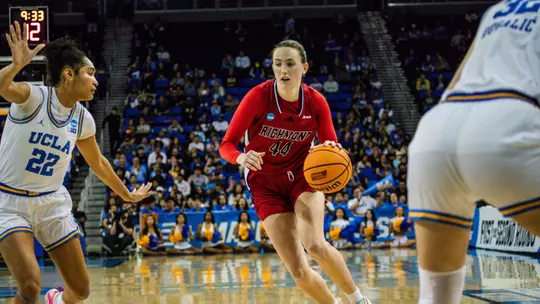 Maggie Doogan dribbling against UCLA