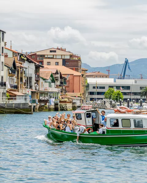 Members of the women's lacrosse team on a boat in the Netherlands