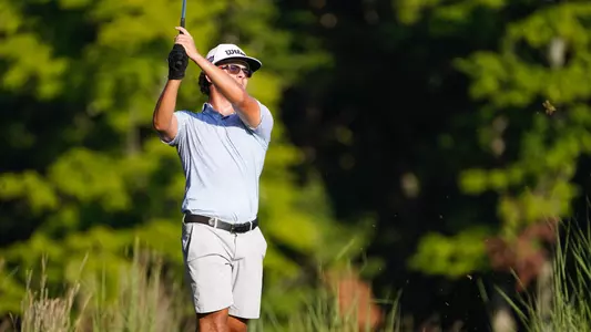 Carson Baez holds his follow through at the Hoosier Amateur