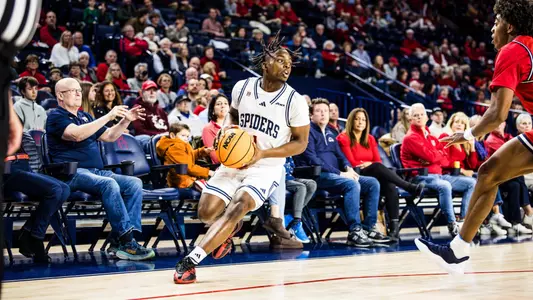 Mikkel Tyne receives a pass and turns upcourt