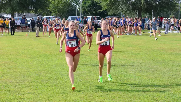 Brooke Reif and Addie Cohen running at 2025 Spider Alumni Open