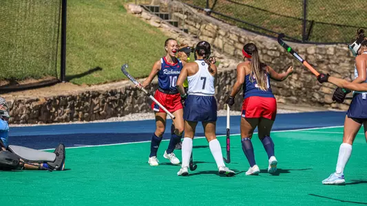 Spider field hockey's Lainey Nichols celebrates scoring against Georgetown