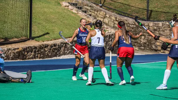 Spider field hockey's Lainey Nichols celebrates scoring against Georgetown