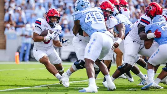 Aziz Foster-Powell carries the ball during Richmond's game at North Carolina on Sept. 13, 2025