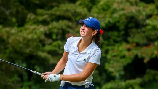 Katie Magner stares down her approach shot to the green