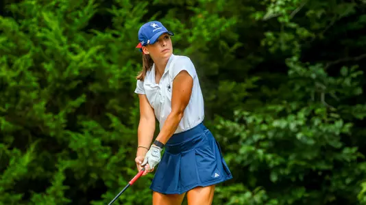 Olivia Wilkie lines up her drive from the tee box