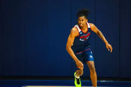 AJ Lopez cuts to the basket during a practice