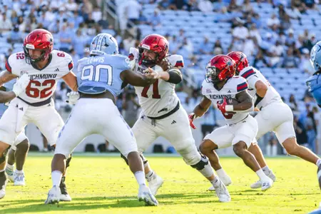 Scott Hummel pushes a guy around at North Carolina on Sept. 13, 2025