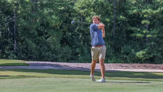 Jack LaPiana holds his follow through after a drive