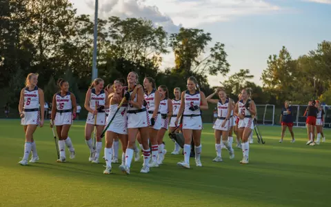 Spider field hockey celebrates the victory over La Salle