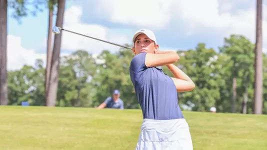 Katie Magner holds her follow-through after a tee shot on a Par 3