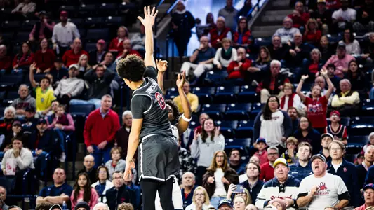 Mikkel Tyne attempts a game-winning three-pointer