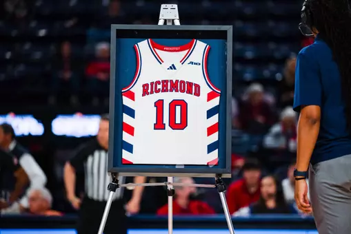 An easel with a framed Greg Beckwith jersey on it